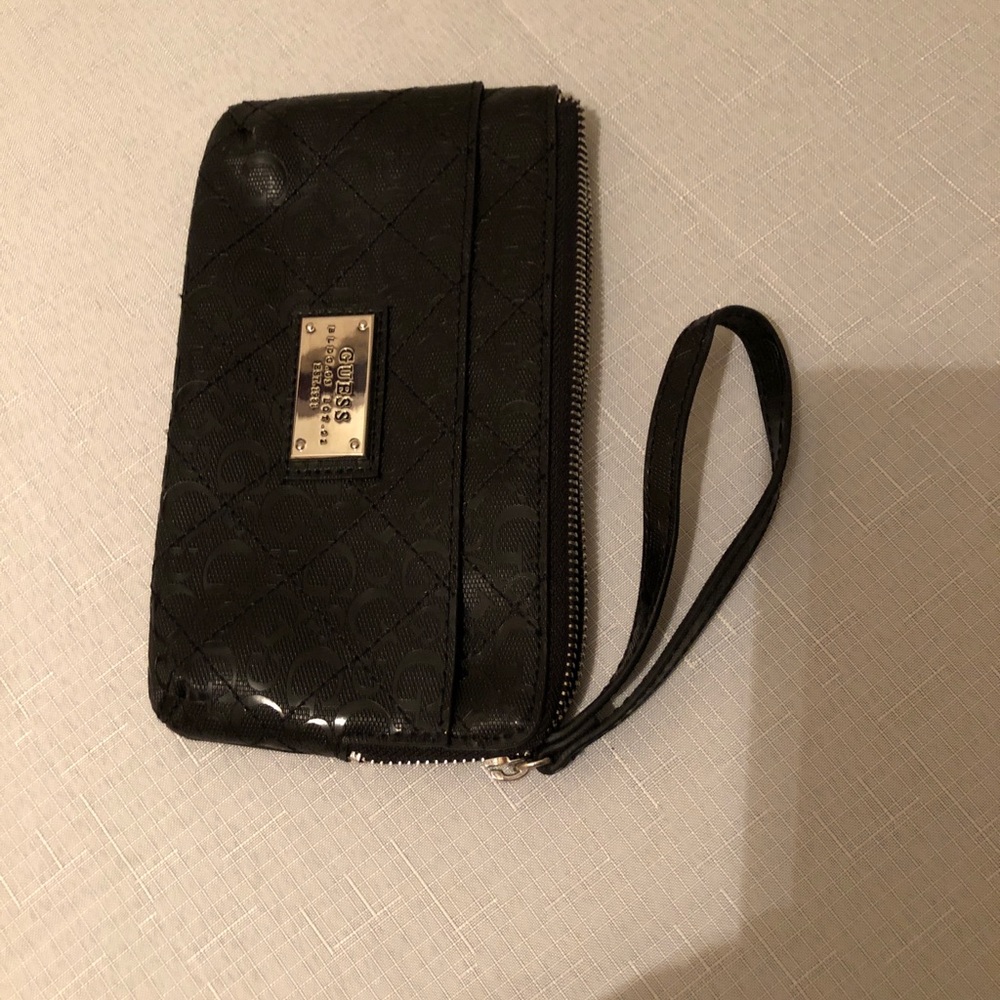 Black guess purse with wrist band